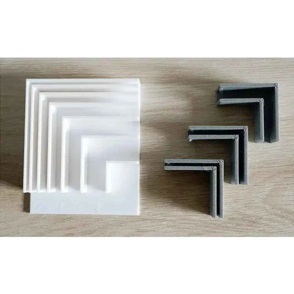 Complete bookbinding toolkit with various bone folders and corner protectors for precise book fabrication