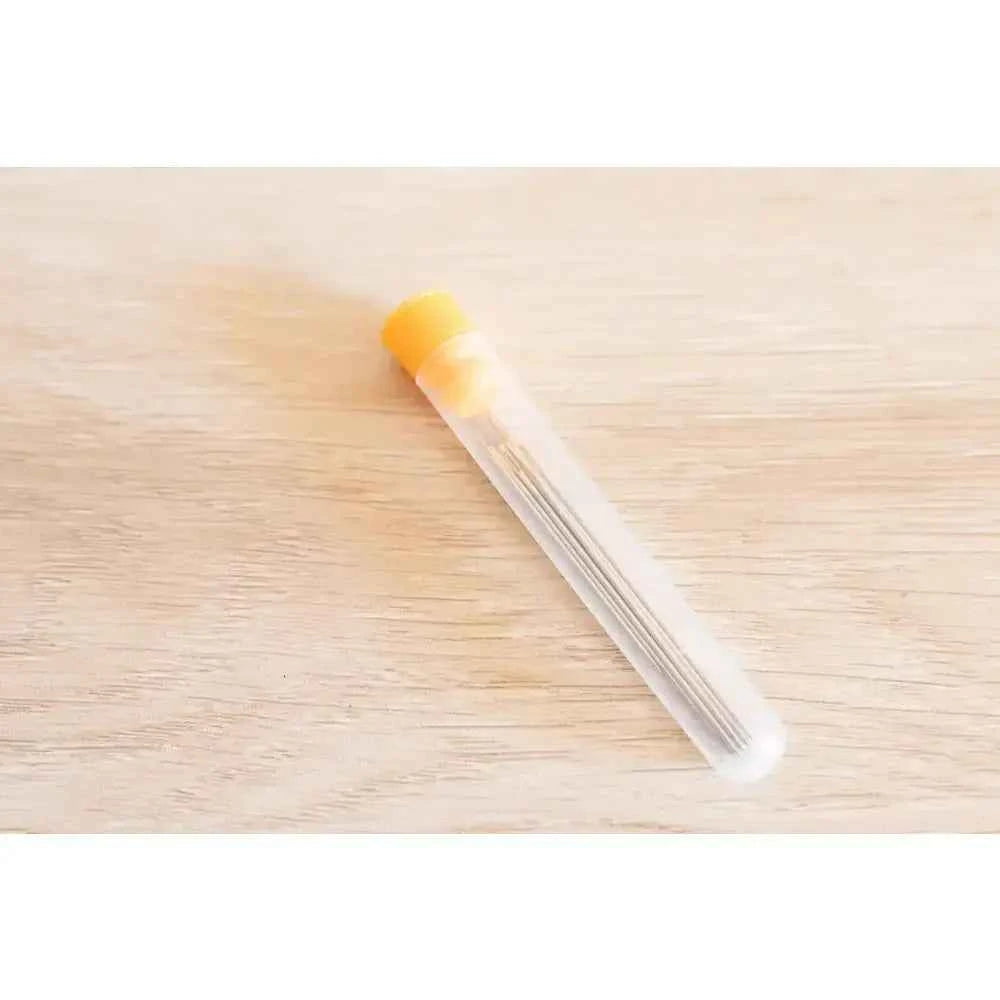 The Create Studio book binding sewing set with a clear storage tube for organizing needles