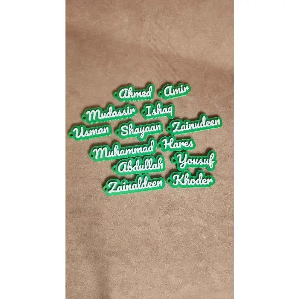 Custom name keychain featuring green personalised names for a unique touch