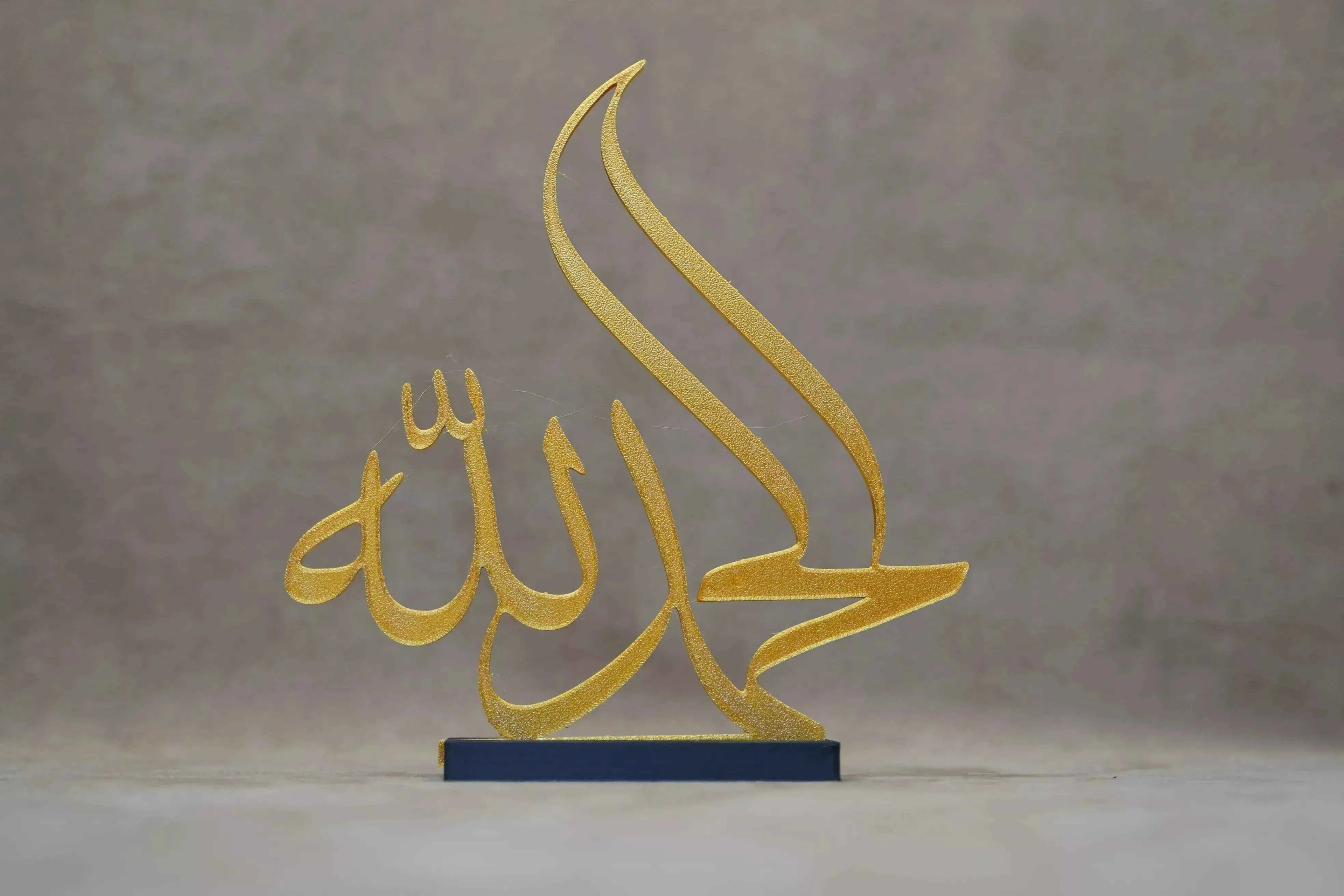 Elegant Gold Islamic Calligraphy Table Decor with a Stylish Design for Home Decoration