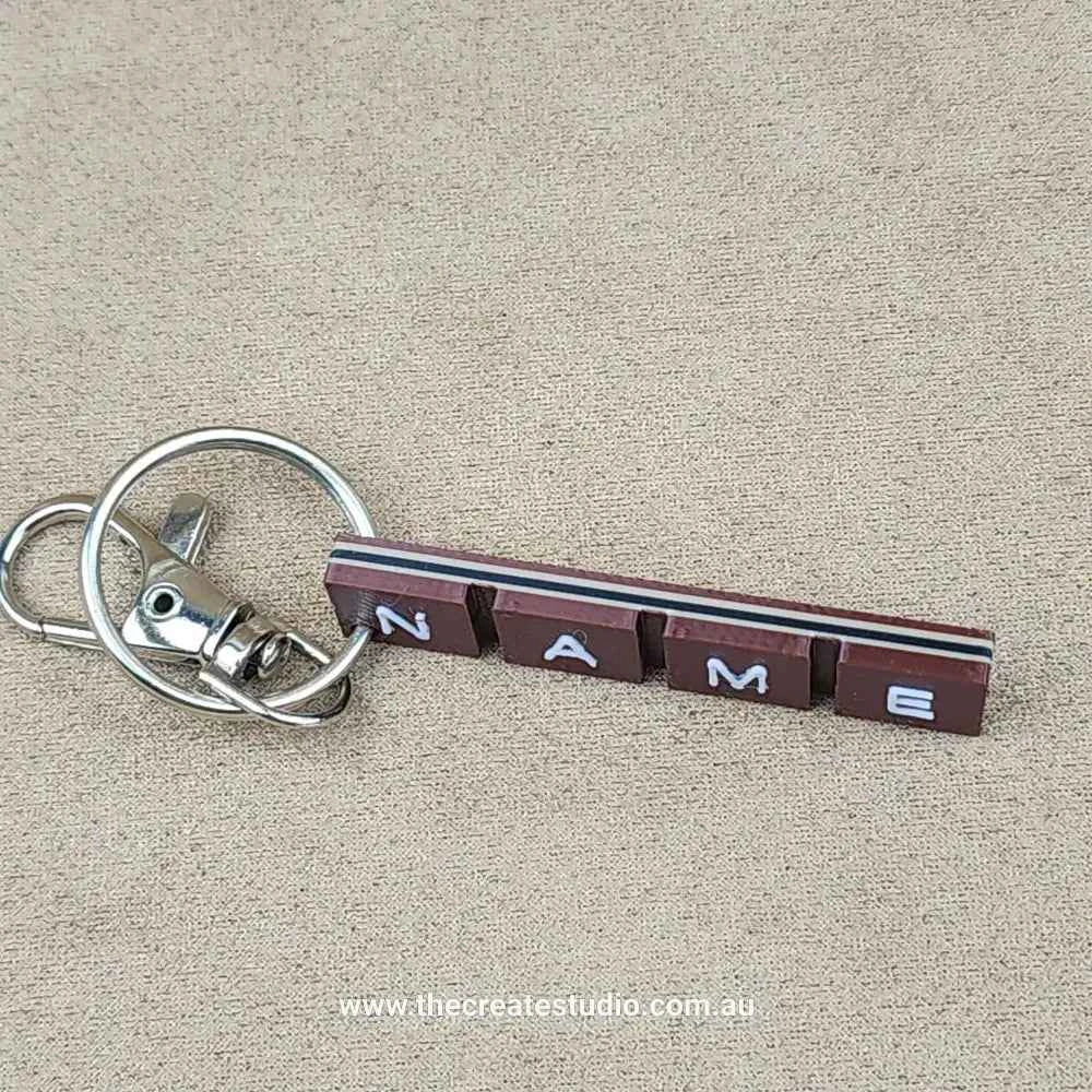 Personalised chocolate bar keychain with custom name design in a stylish layout