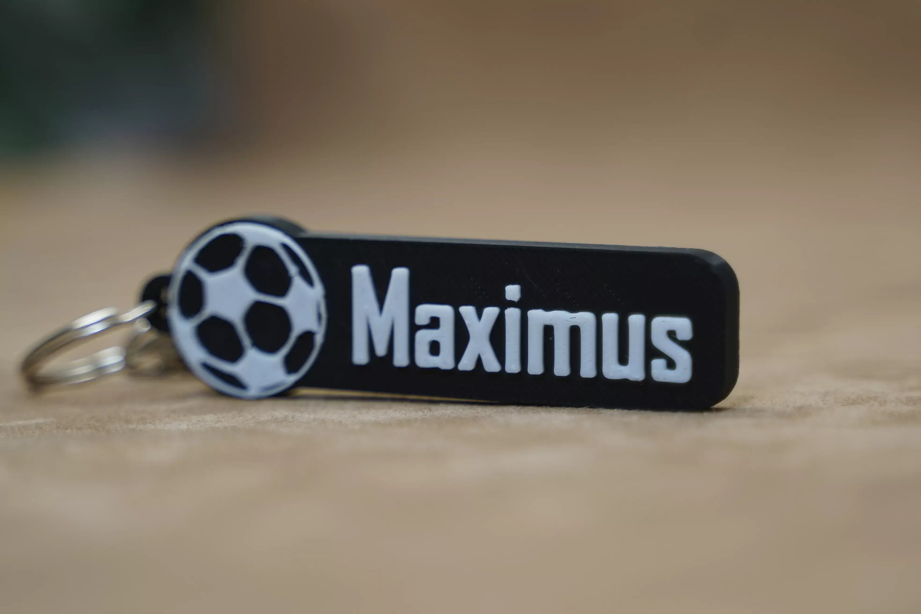 Personalised football keychain with custom name Maximus and soccer ball design