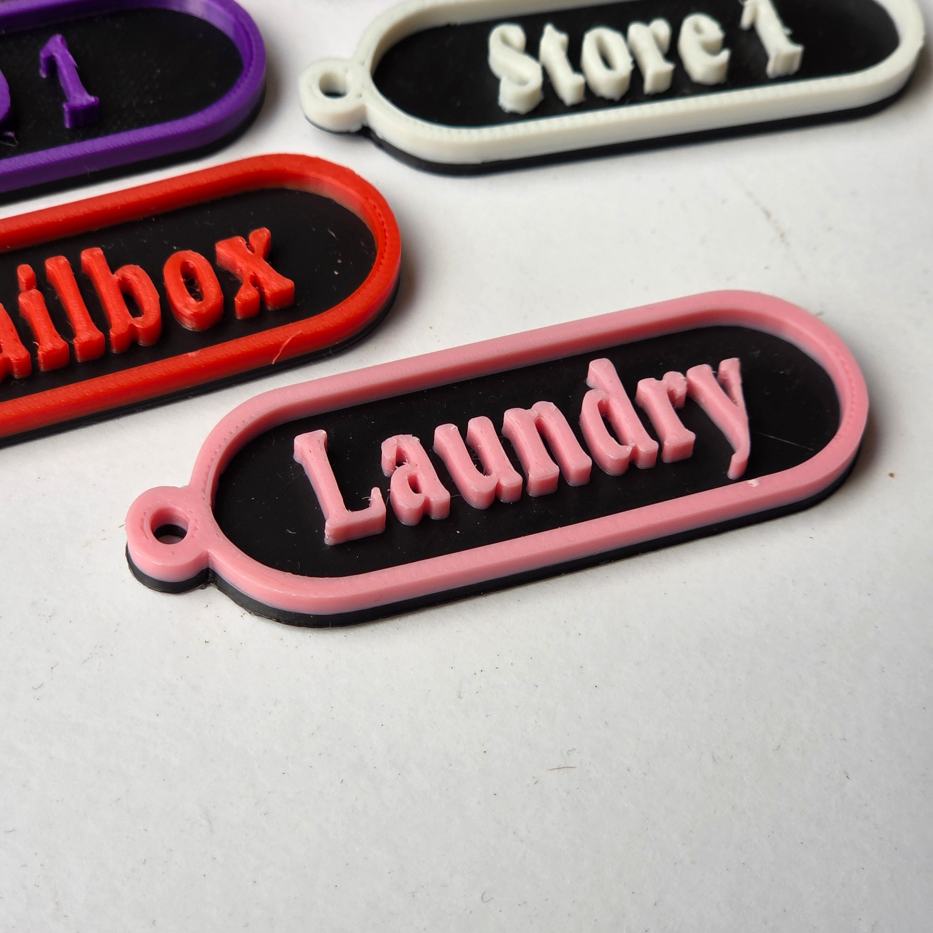 Set of personalised keychain tags in various colours for easy organisation and identification
