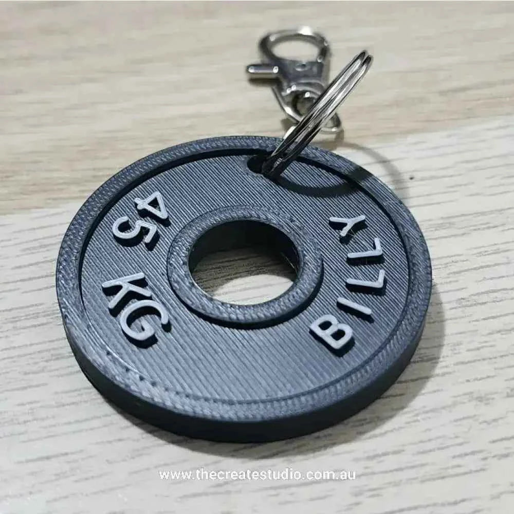 Personalised weight plate keychain with custom name detail for fitness enthusiasts