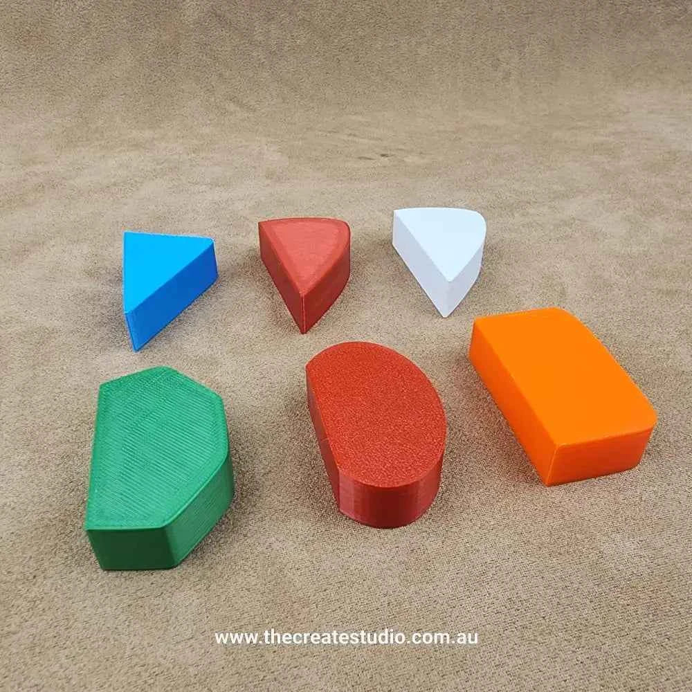 Set of pottery mug handle molds in various colors for shaping ceramic handles easily