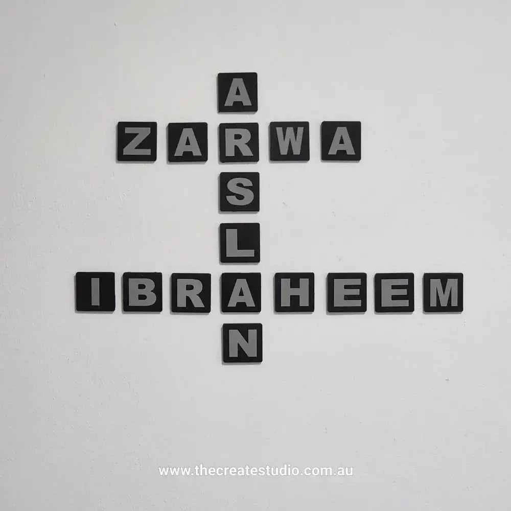 Personalised family tree gift wall art featuring names in modern black letter tiles