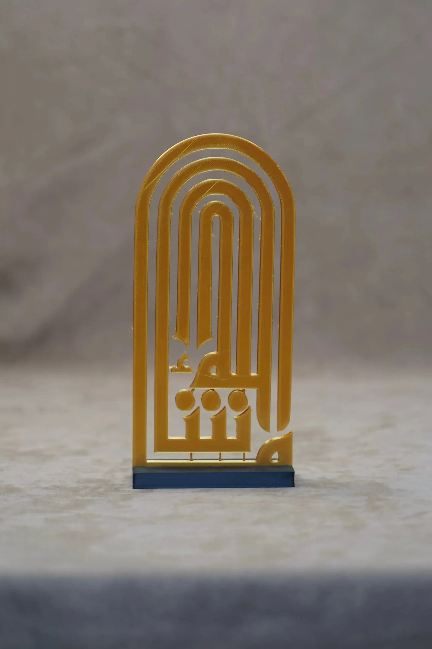 Islamic calligraphy table plaque in yellow, showcasing intricate design for home decor.