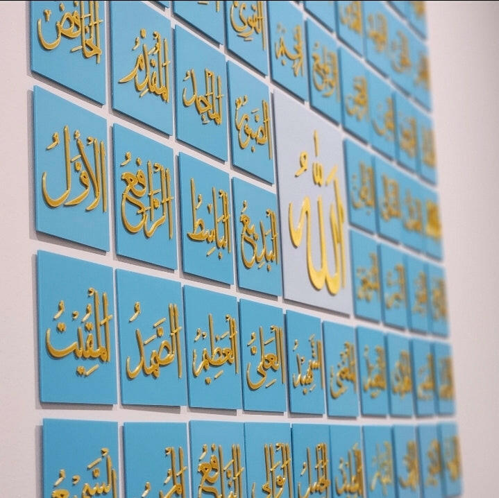 Blue and gold 99 Names of Allah wall art from The Create Studio displayed in calligraphy tiles