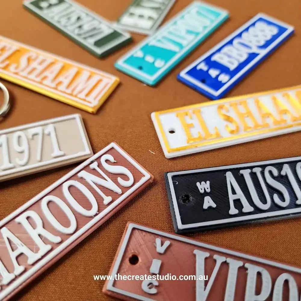 Colourful Car Rego Keychains featuring unique designs and personalised options for car enthusiasts