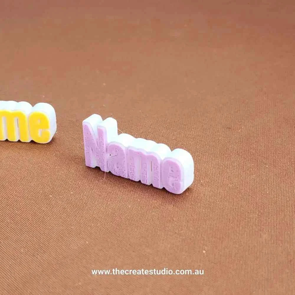 Personalized name charms for crocs in colorful designs by The Create Studio
