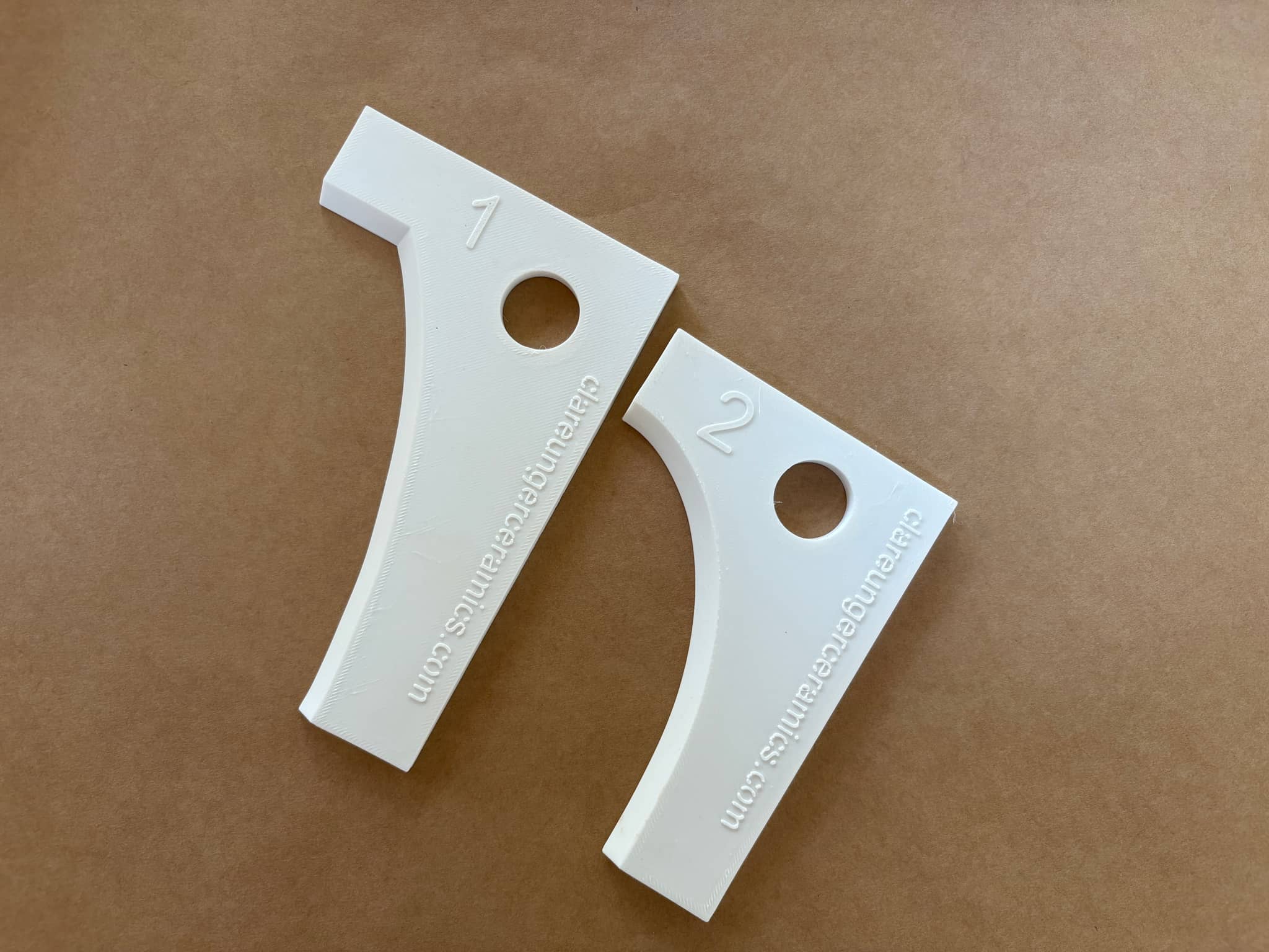 Two white design templates with numbers 1 and 2, designed by Clare Unger for creative projects