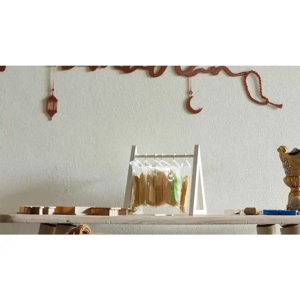 White countertop cookie display rack showcasing delicious cookies for decorative serving