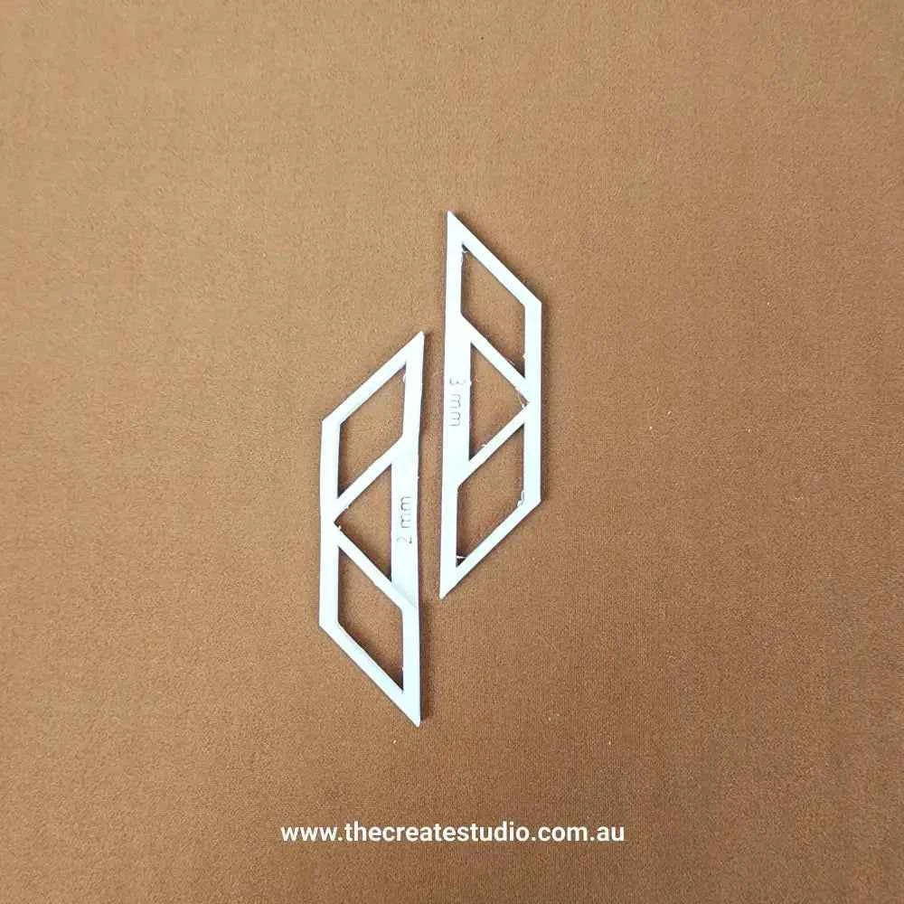 The Create Studio book binding corner tool in white for precise corner rounding in DIY projects