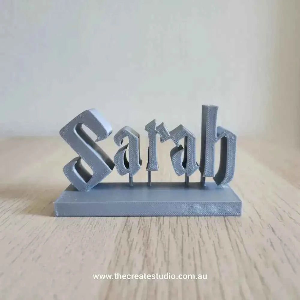 Personalized Harry Potter desk name plaque in gray featuring a unique font design