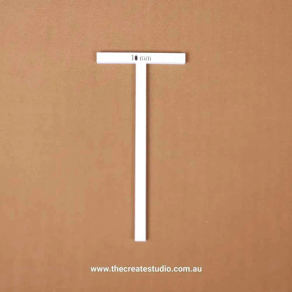 T-piece binding accessory from The Create Studio for precise binding measurements in crafting