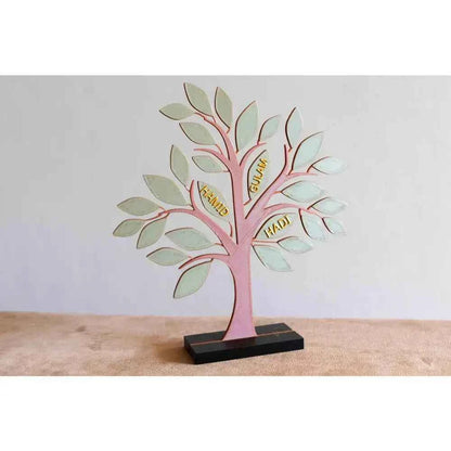 Custom family tree decor in pastel colors with engraved names on the branches for personalized home decoration
