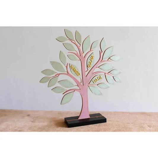Custom family tree decor in pastel colors with engraved names on the branches for personalized home decoration