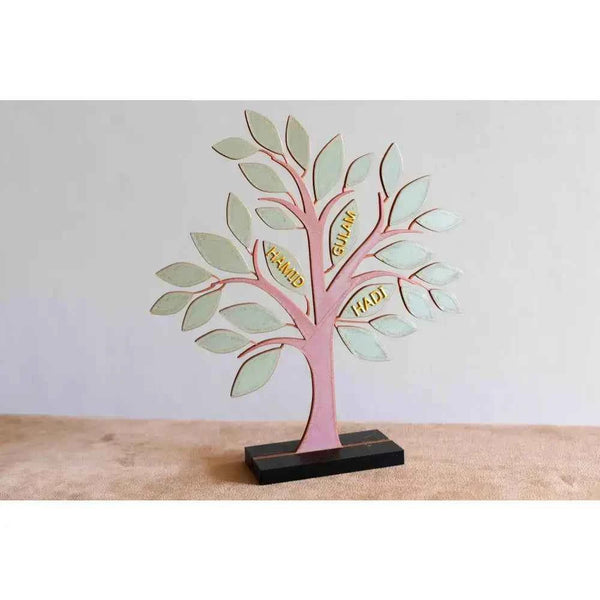Custom family tree decor in pastel colors with engraved names on the branches for personalized home decoration