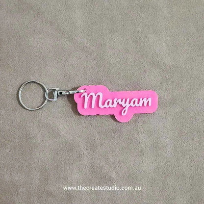 Custom name keychain in pink featuring the name Maryam in stylish font