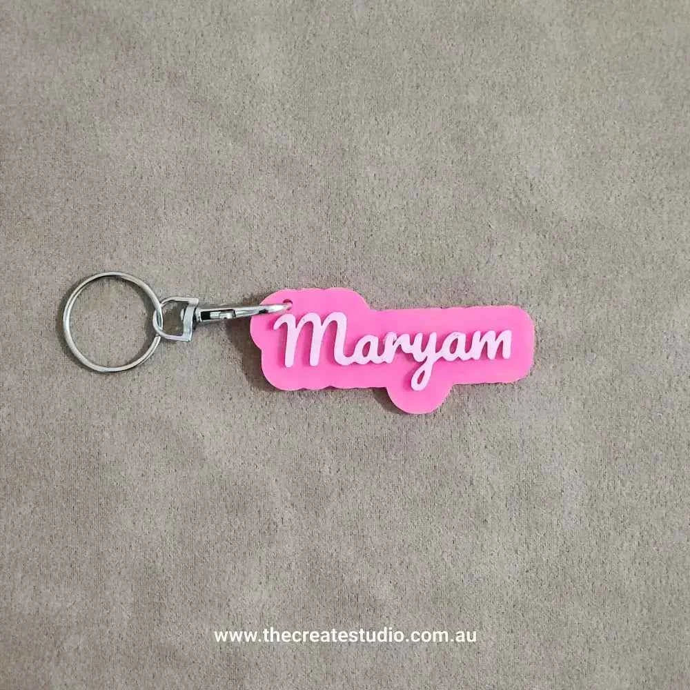 Custom name keychain in pink featuring the name Maryam, perfect for personalising bags or keys