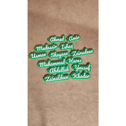 Variety of colorful custom name keychain designs from The Create Studio for personalization