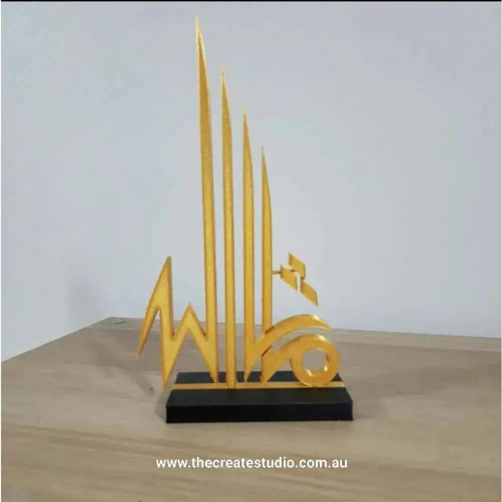 Elegant Islamic calligraphy tabletop art in gold with a modern design for home decor