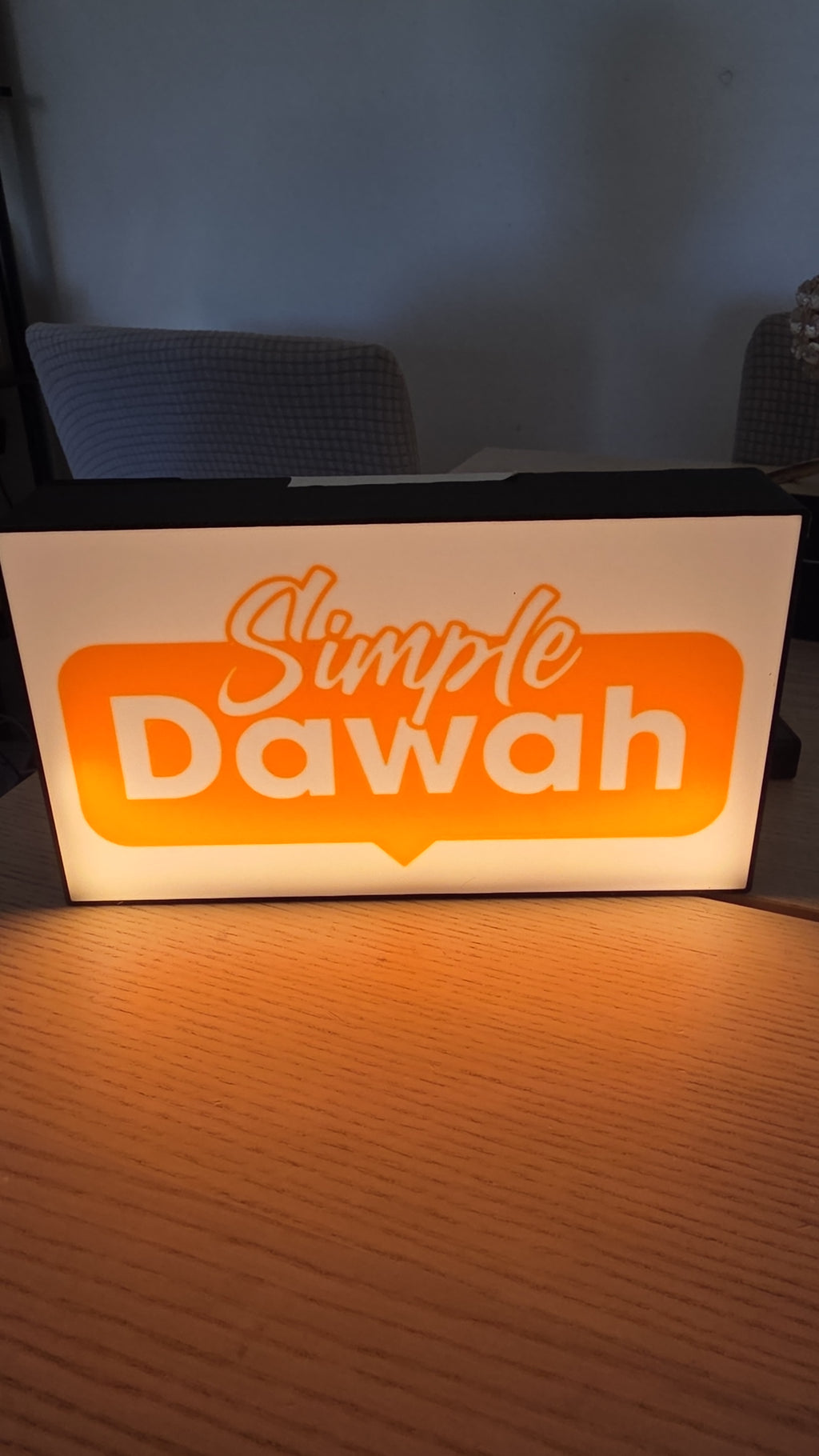 The Create Studio unique corporate desk light box showing orange Simple Dawah logo on white acrylic panel