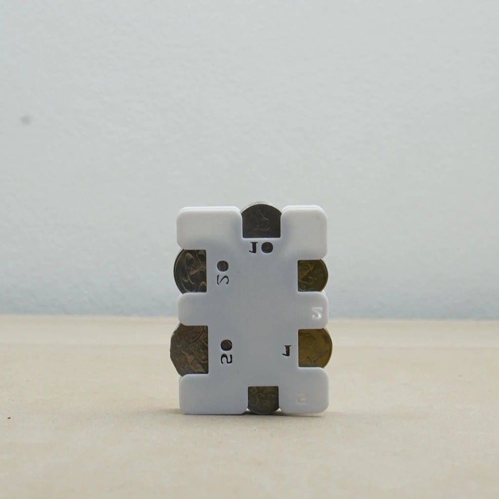 The Create Studio white plastic personal coin holder with labelled slots holding coins compact personalised gift for collectors