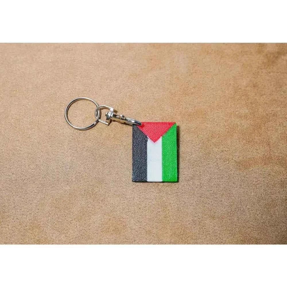 Palestine Keychain featuring a colorful flag design with red, black, and green colors