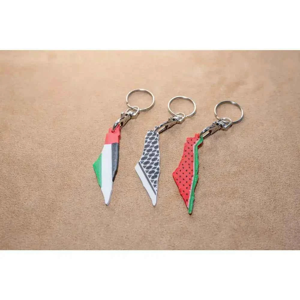 Palestine Keychain Set featuring three designs in vibrant colors on metal keyrings