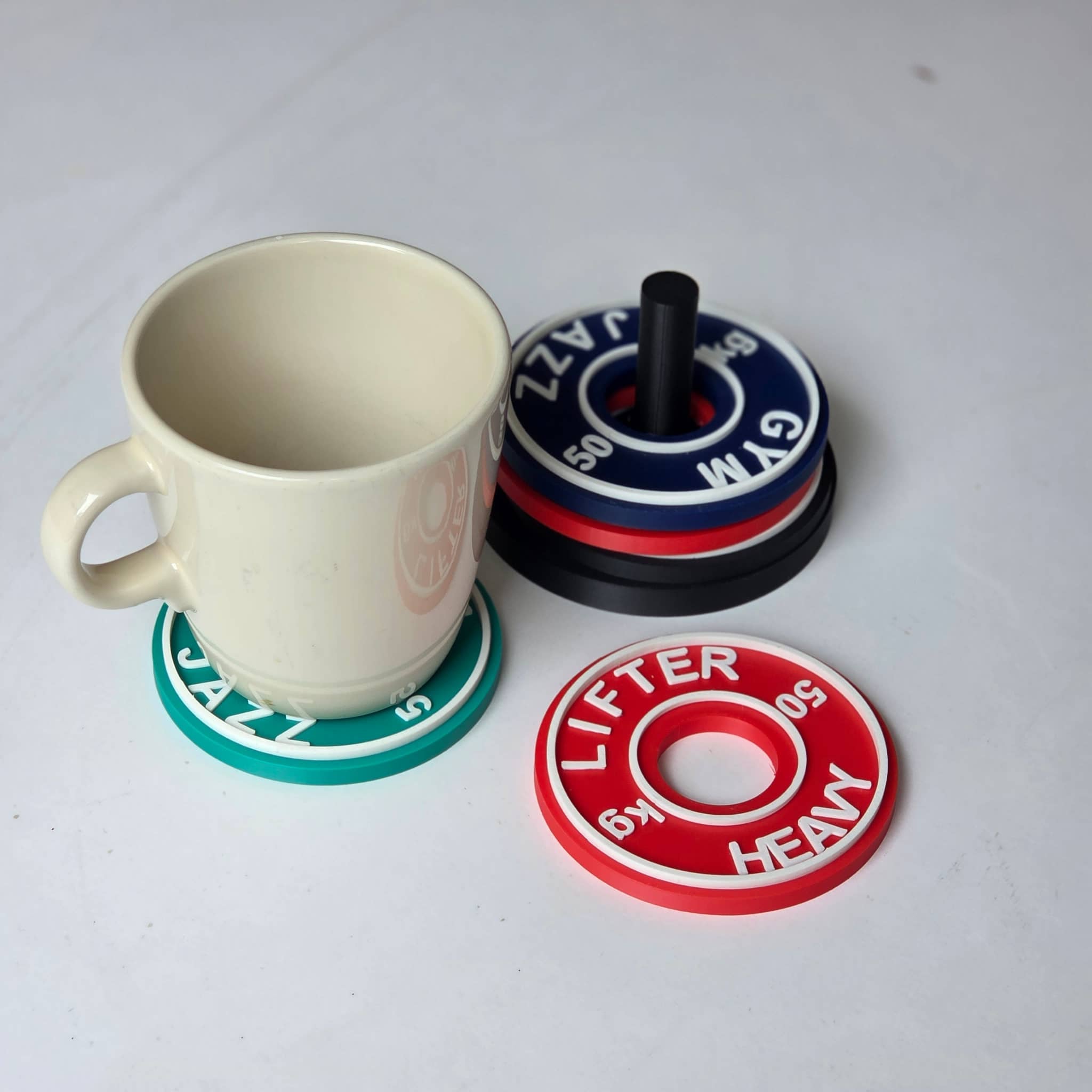 Personalised gym coasters designed as weight plates, perfect for fitness enthusiasts
