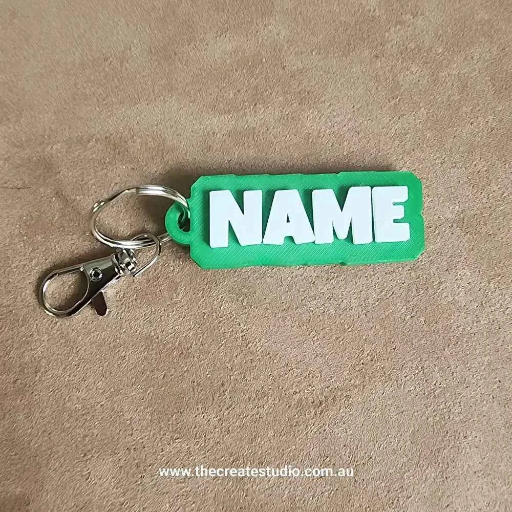 Green personalised keychain with name in white letters for custom identification