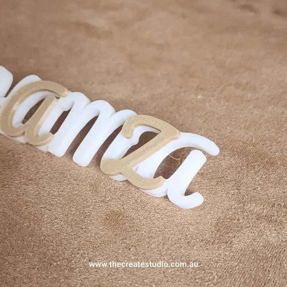 Personalised keychain with name made from acrylic in white and gold for a custom touch