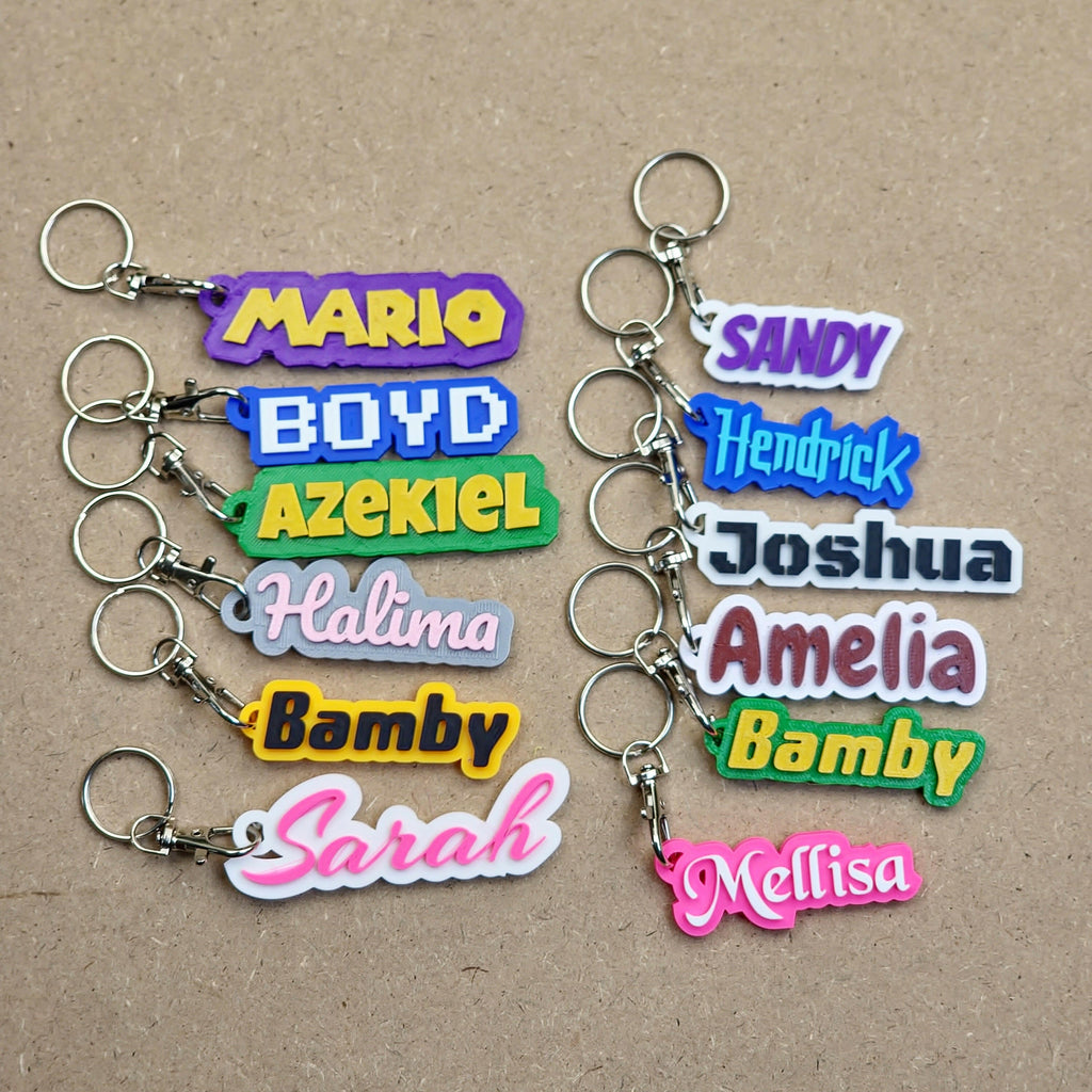 Assorted personalised keychains with modern fonts in vibrant colours and different names from The Create Studio