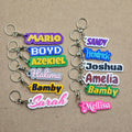 Assorted personalised keychains with modern fonts in vibrant colours and different names from The Create Studio