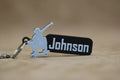 Personalised skater keychain featuring a skateboarder silhouette and custom name 'Johnson'