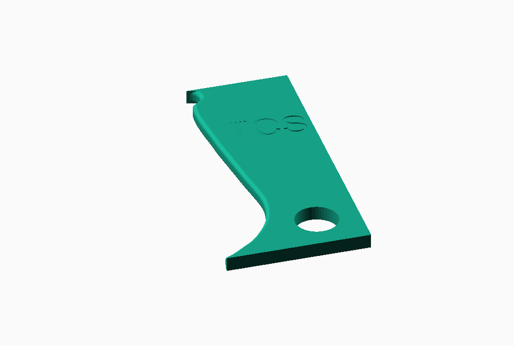 The Create Studio pottery rib tool in green designed for shaping and smoothing clay surfaces