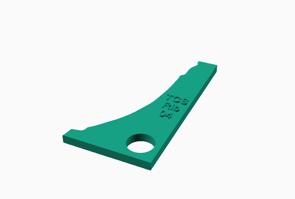 Green pottery rib tool designed for smoothing and shaping clay surfaces
