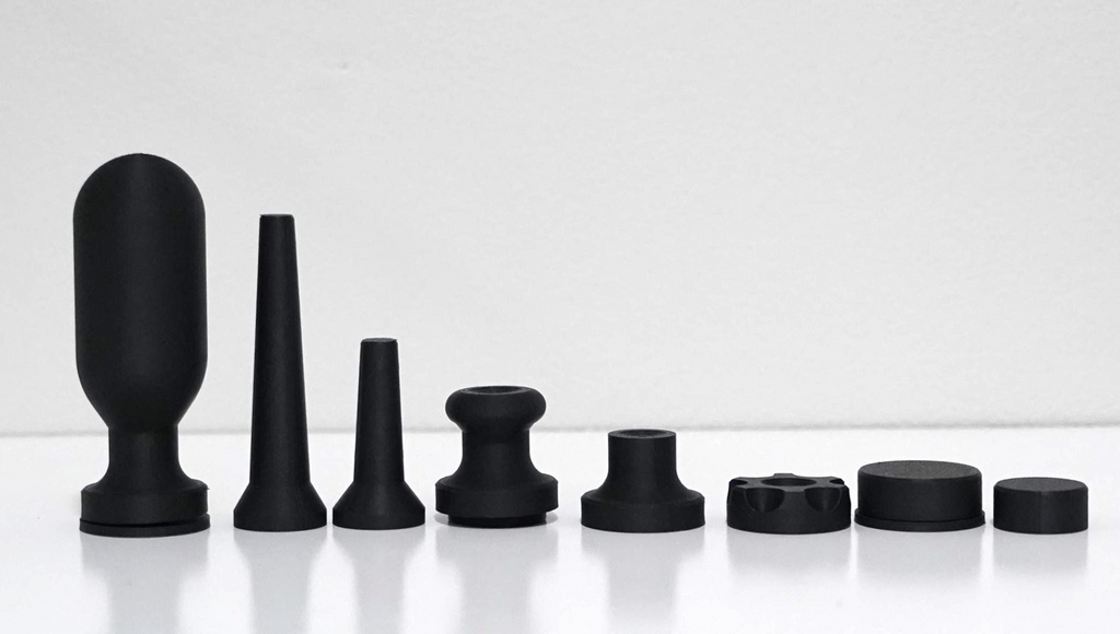 Assorted black pottery spinner tools for shaping and finishing pottery projects