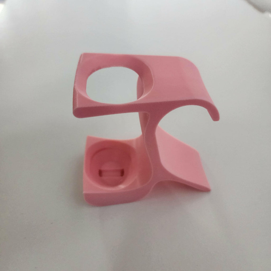 Pink pottery wheel tool holder designed for easy access to pottery tools during crafting