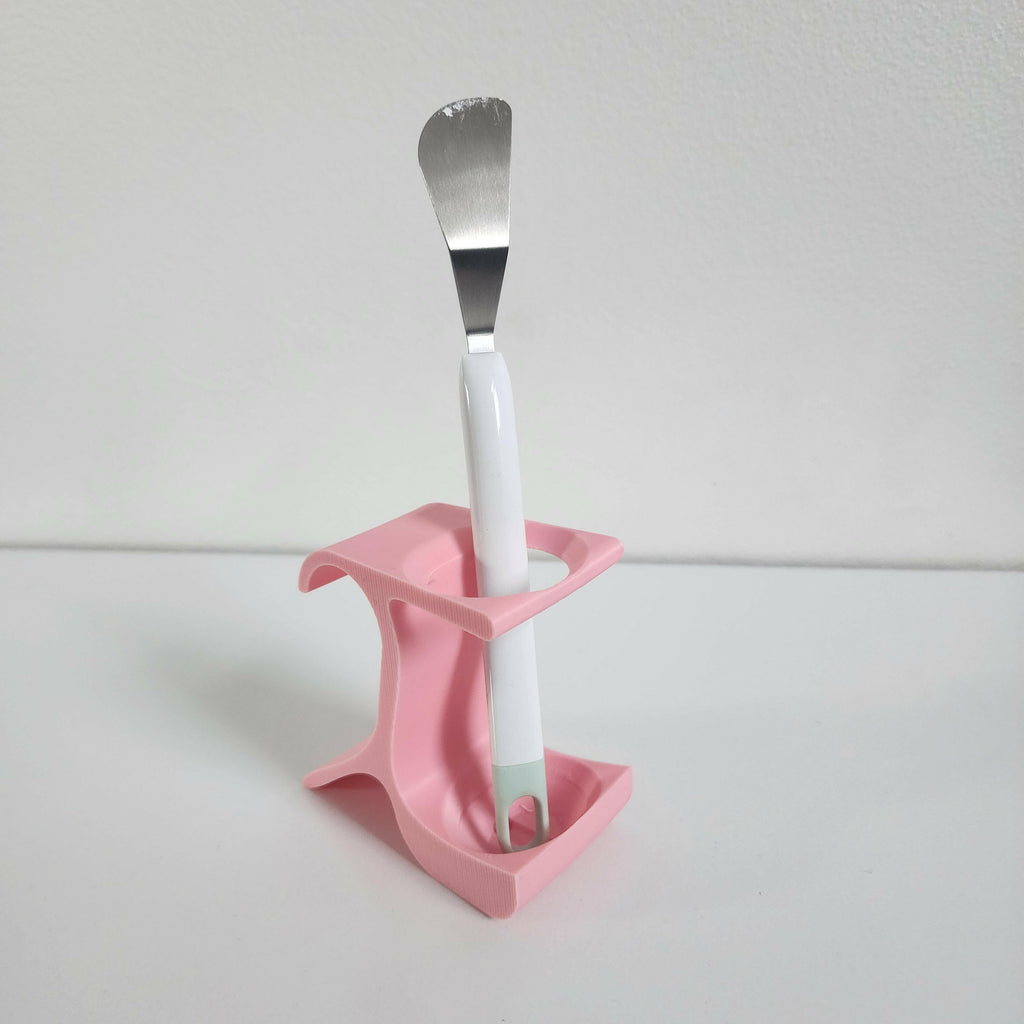 Pink pottery wheel tool holder with spatula for organizing pottery tools neatly