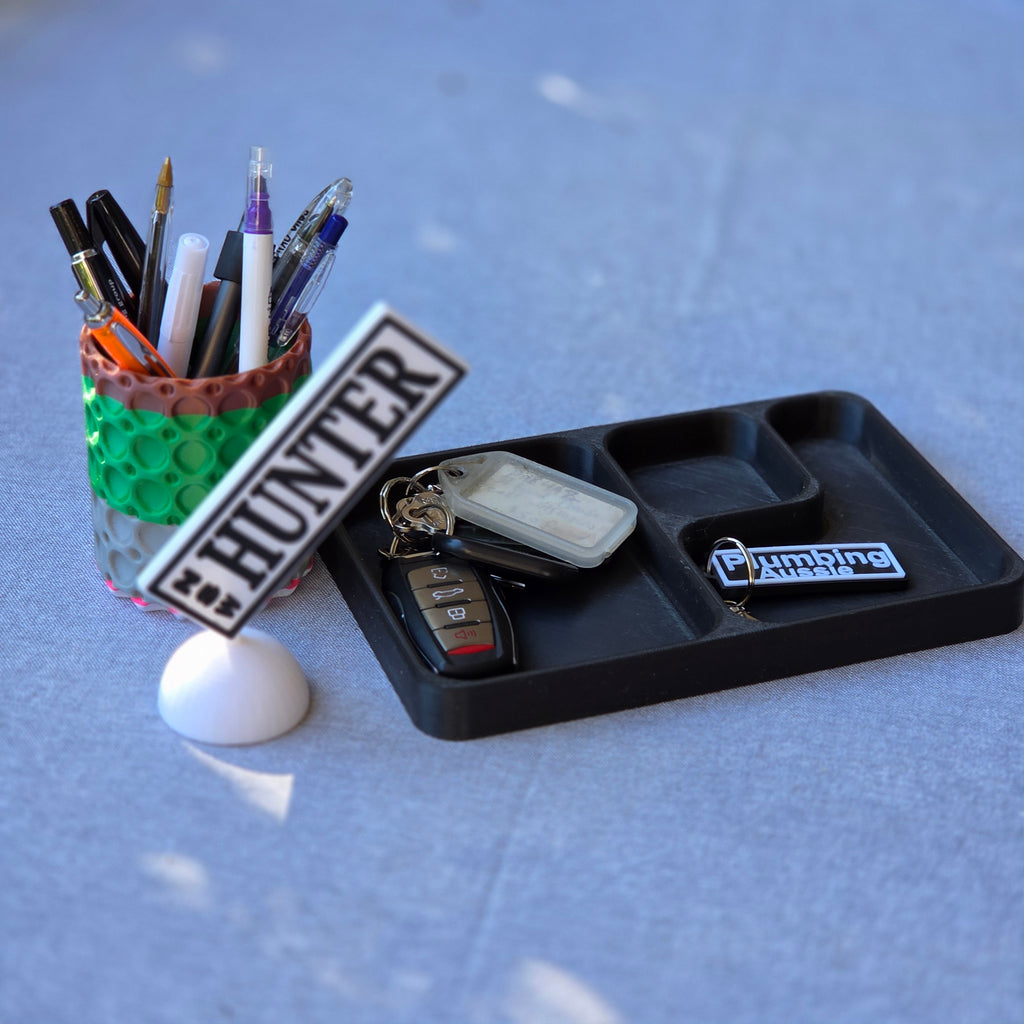 Desk tray with car keys and personalised miniature HUNTER plate beside pen pot unique car registration plate gift