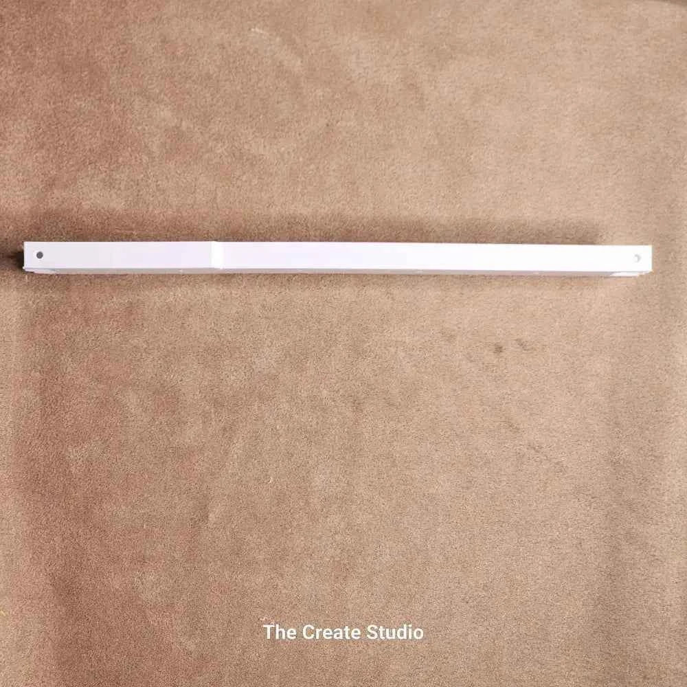 White wooden hive side bar with pre drilled holes on carpet suitable for frames deep side bars for bee keeping