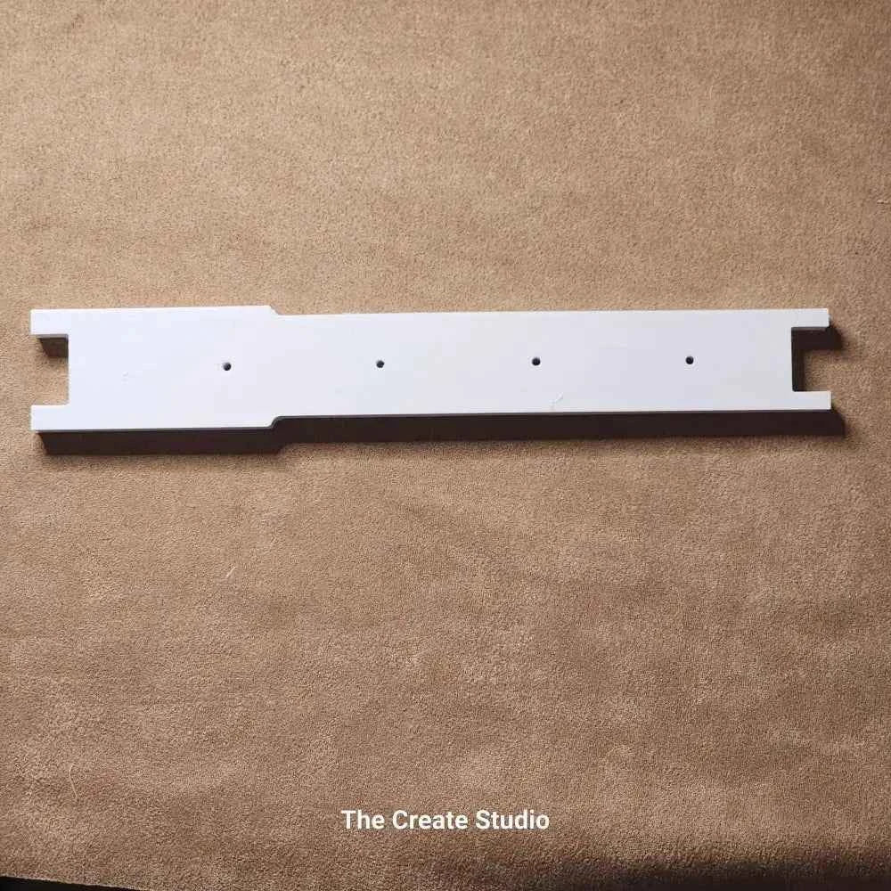 White wooden deep side bars for bee keeping by The Create Studio showing notched hive bar