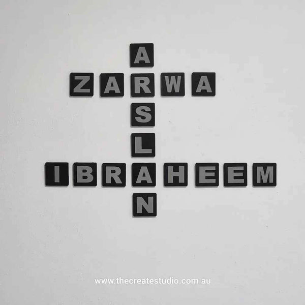 Personalised family tree gift wall art featuring names in modern black letter tiles