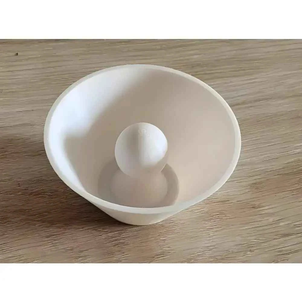 White pottery trimming tools pottery used for shaping and refining clay with a smooth conical design